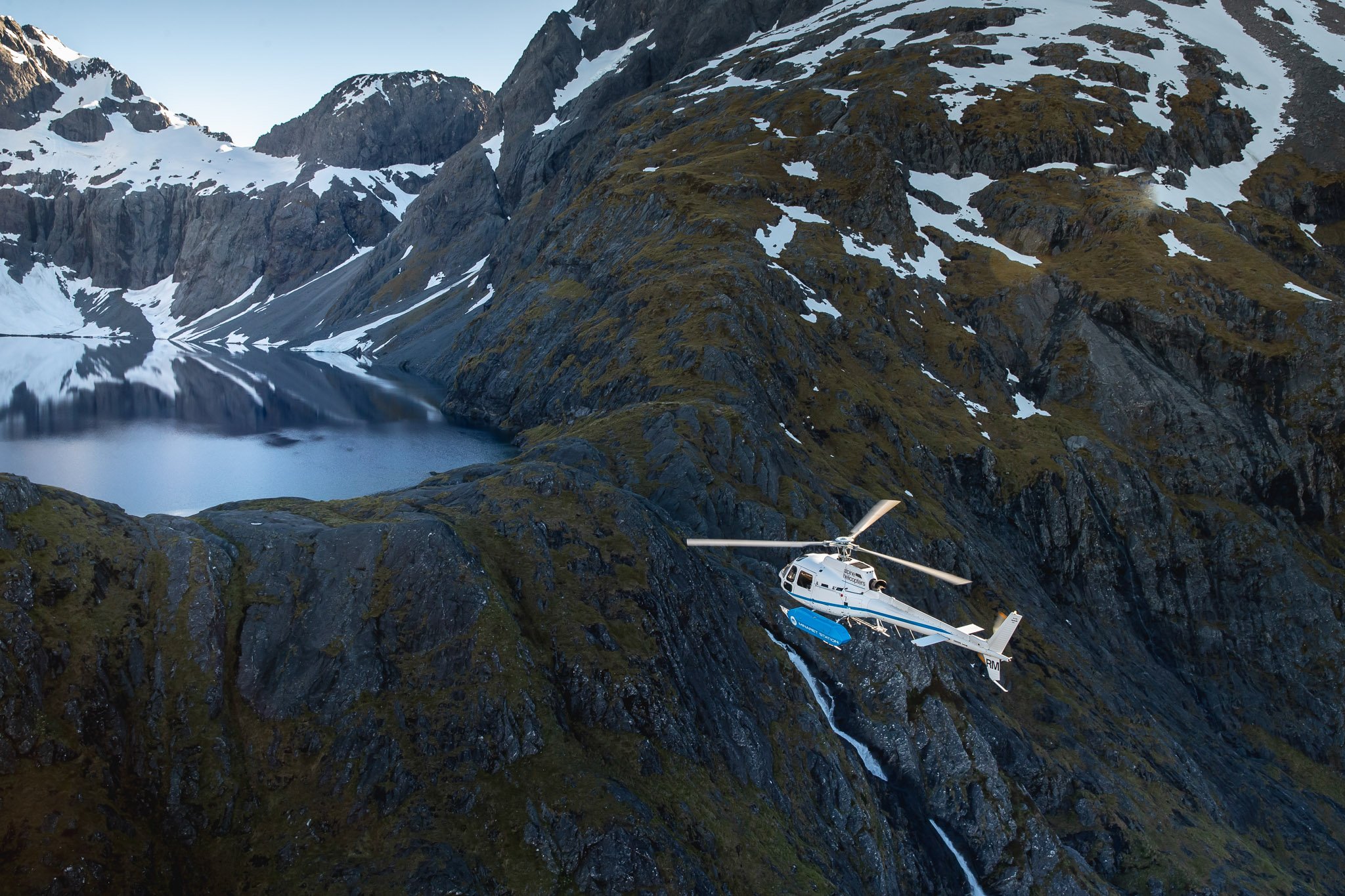 Private helicopter flight to Minaret Station on a private travel itinerary with Seasonz and Poe Travel