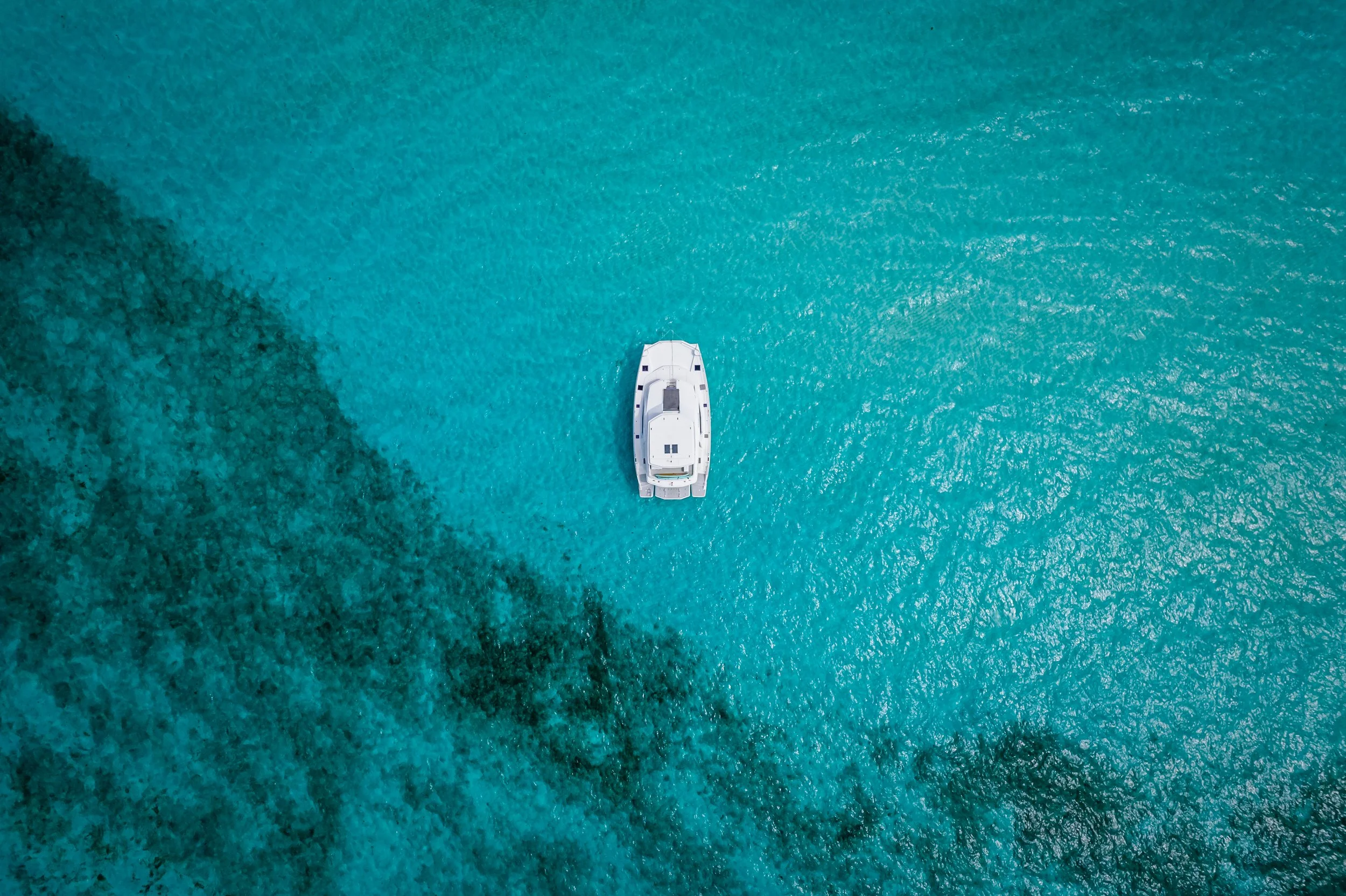 Private catamaran yacht for snorkeling excursion in the Caribbean Sea with Journey Mexico