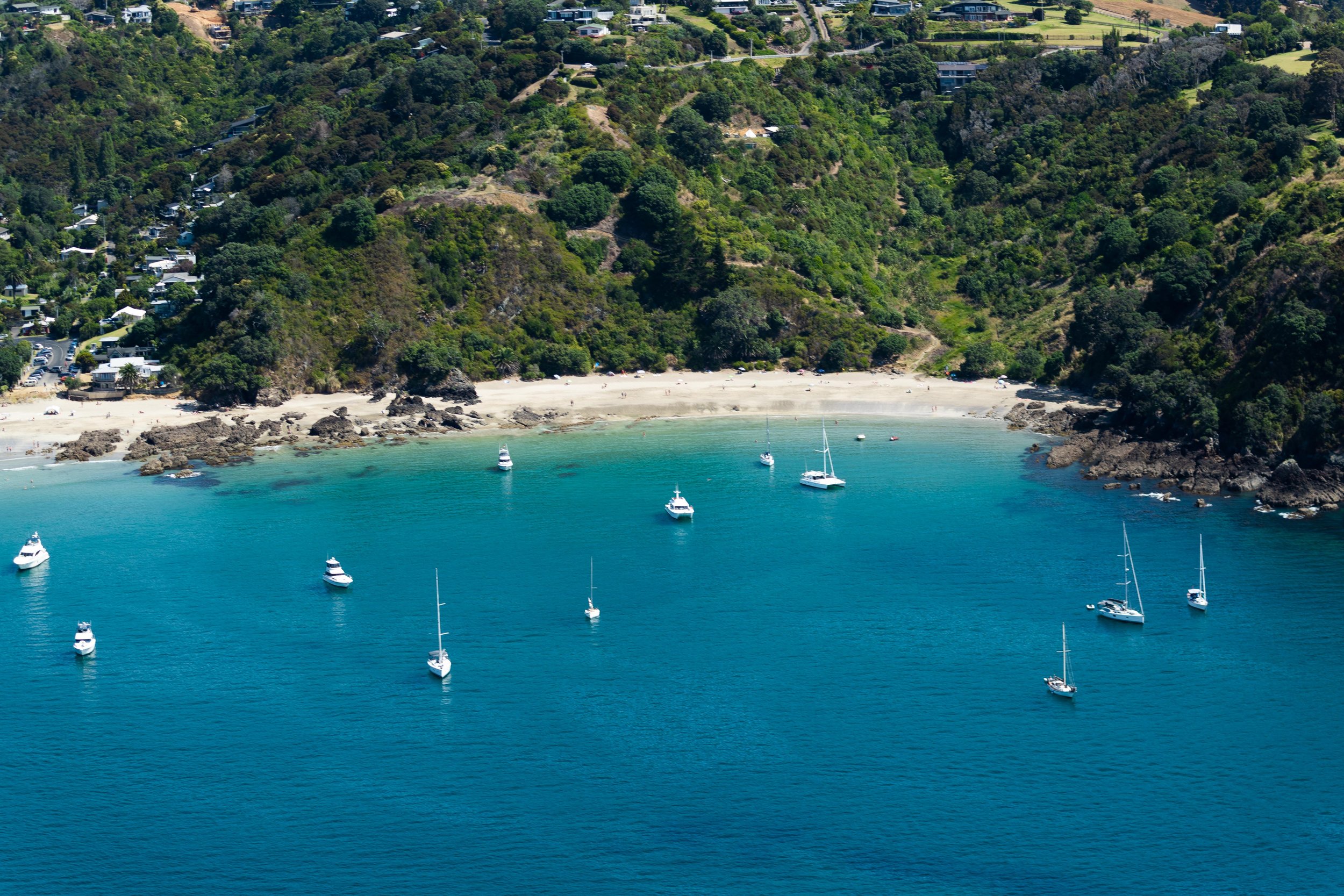 Sandy beach at Waiheke Island with Seasonz bespoke travel itinerary