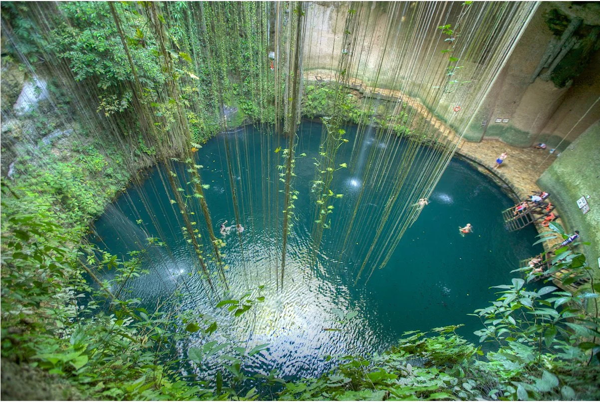Swimming in cenotes at nature park in Riviera Maya Mexico with Journey Mexico custom travel experience