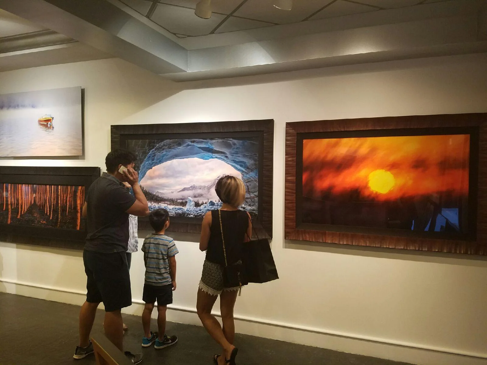Several artworks by Jason Matias in a gallery in Seattle