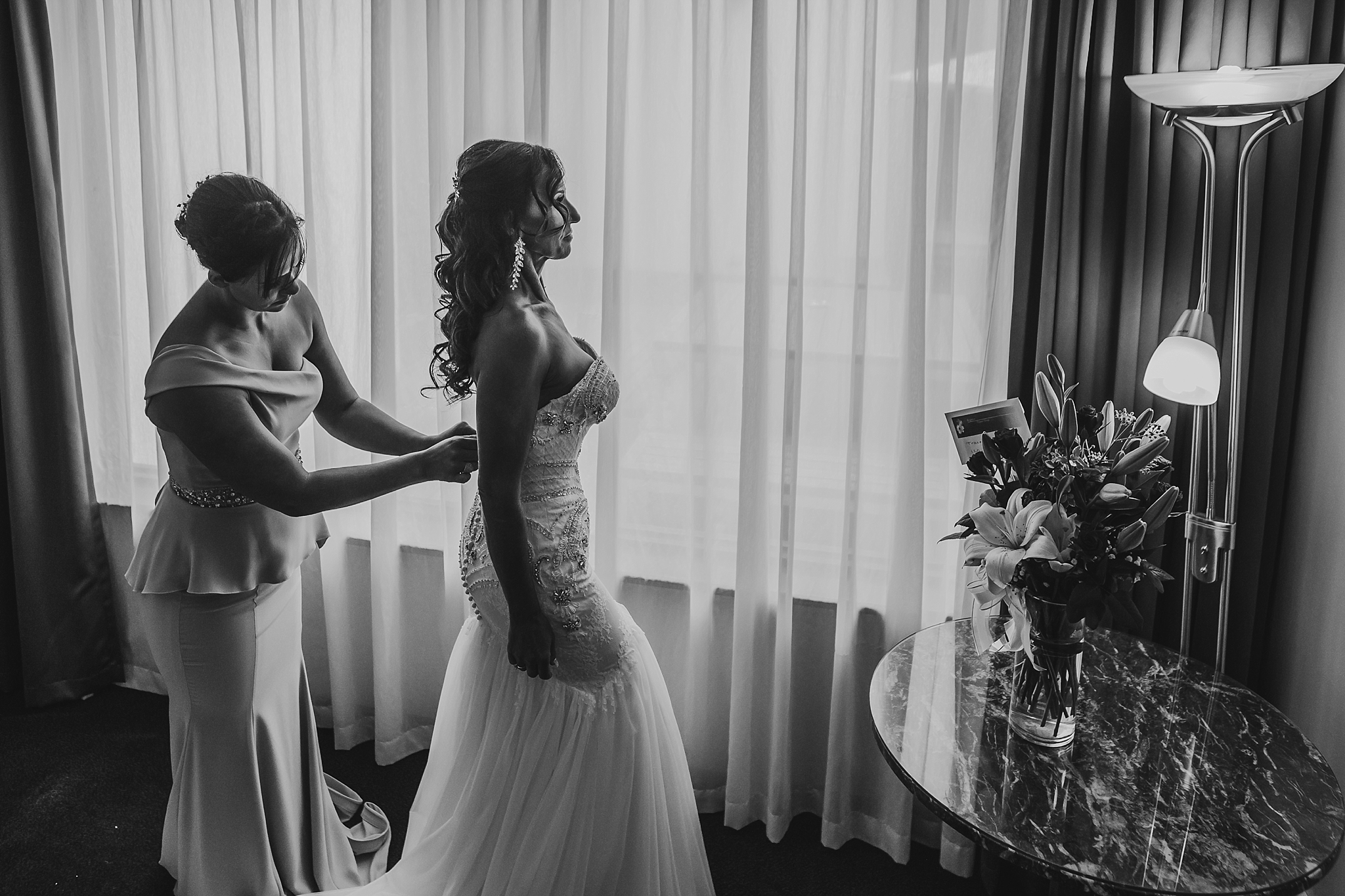 bride getting dressed at brighton savoy