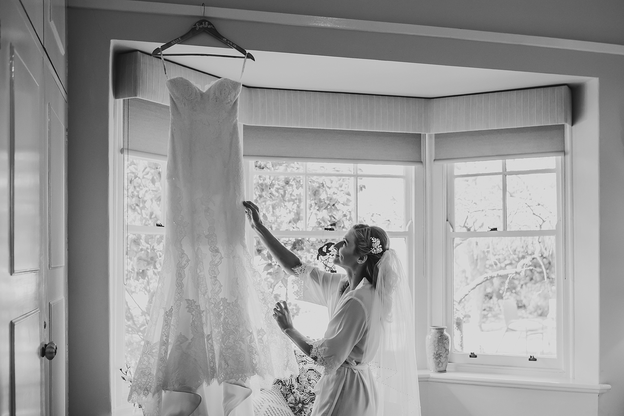 Bride looking at bridal gown