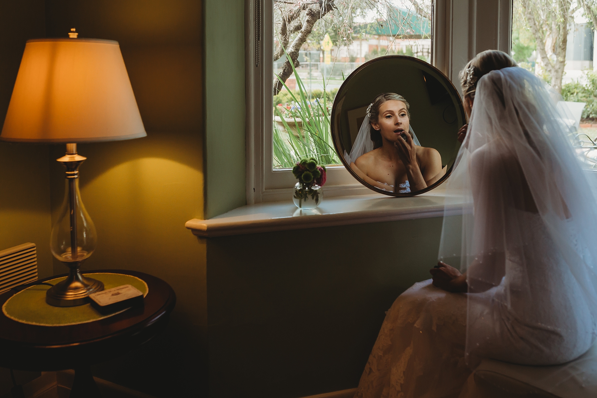 Bride looking in the mirror