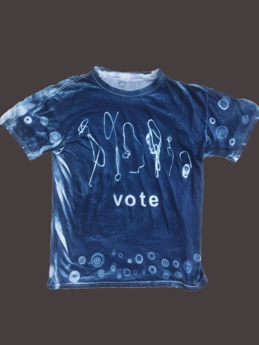 Photogram t-shirt oreoared with cyanotype chemistry articles placed directly on sensitized shirt and exposed to sunlight made for department head at el camino college to message students to 'get out and vote'_edited-3.jpg