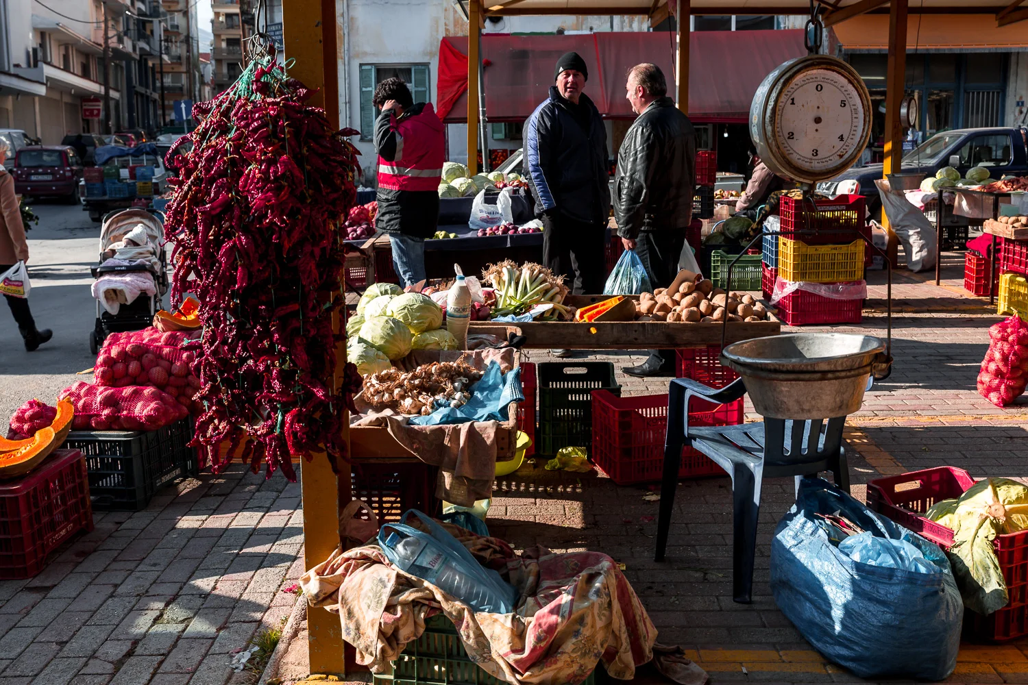 Red Florina peppers hanging at the local flea market every Saturday Morning