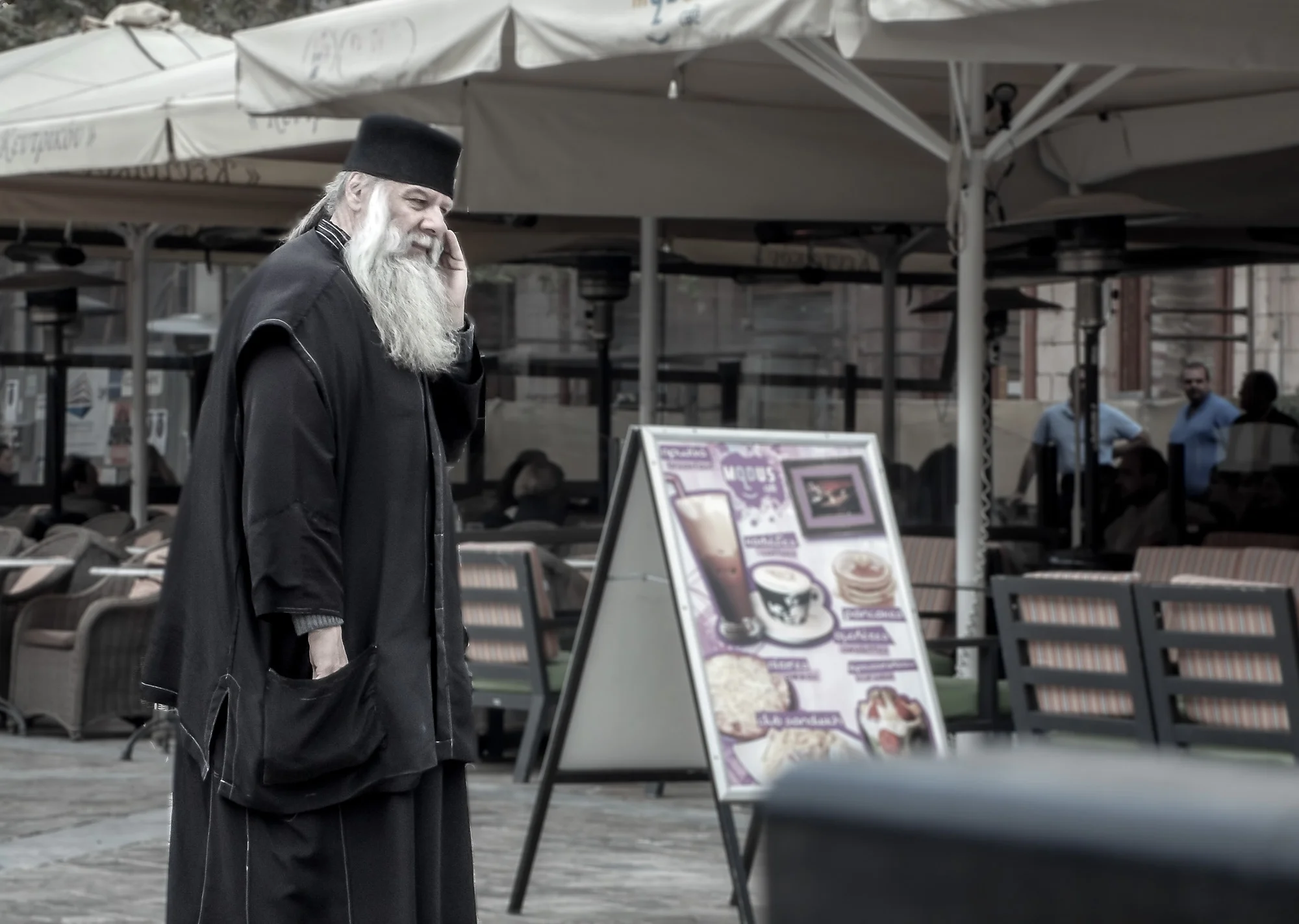 A local priest being busy