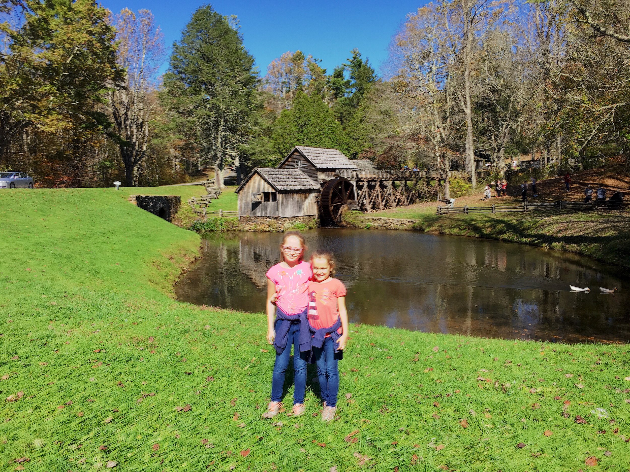 Hadley &amp; Bailey standing in front of the beautiful Mabry Mill. 