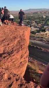 Dixie State Football Players Help Woman Dangling From Dixie Rock