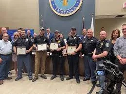 Police Officers Honored for Saving Woman Threatening To Jump off Overpass: ‘She Was Begging Them To Let Go’