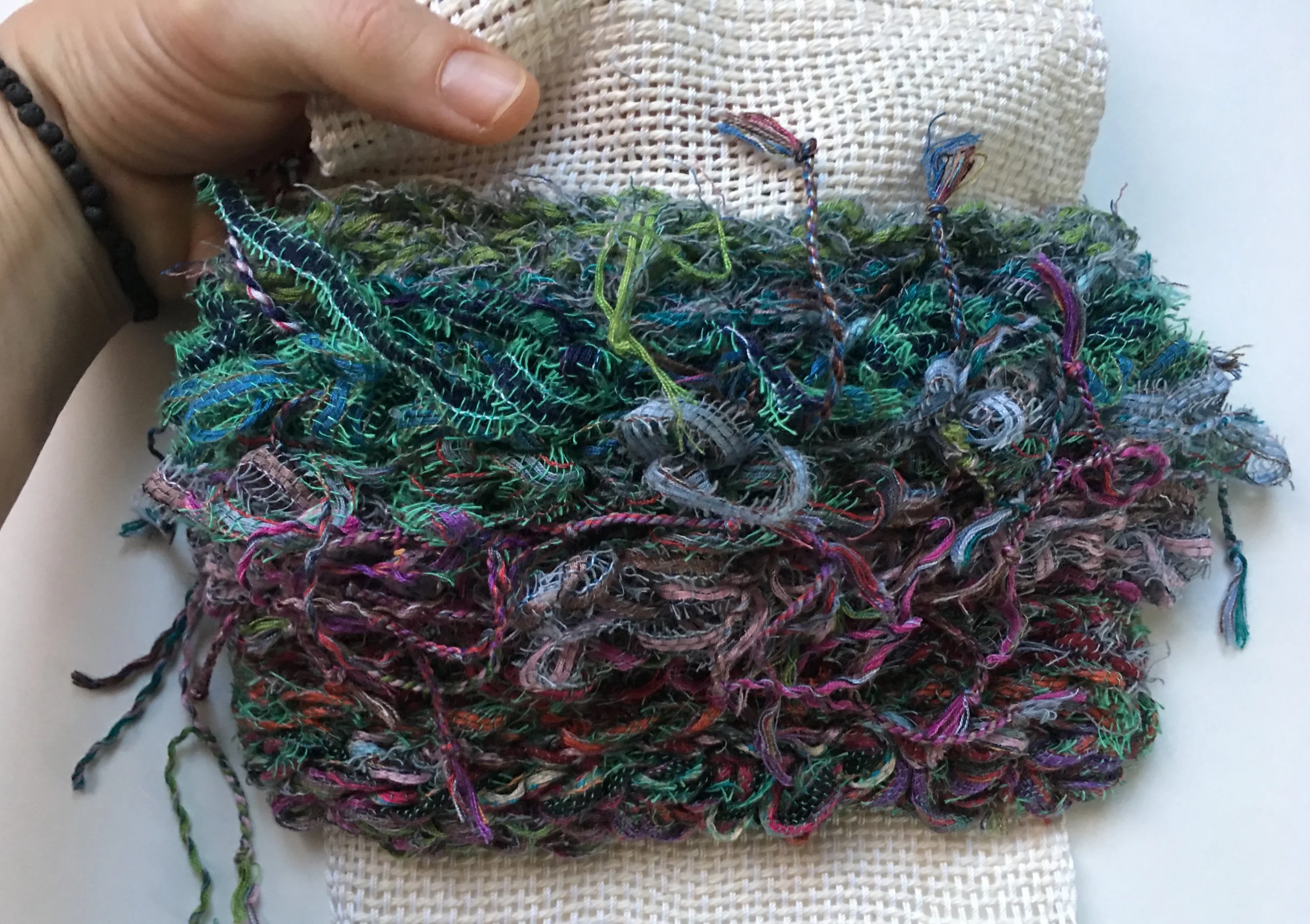  Woven cotton with knotted tassel fibers from India.  