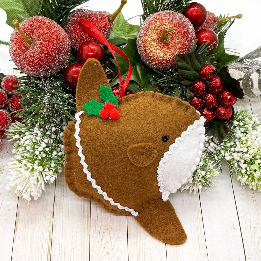 Gingerbread style mola mola felt ornament.