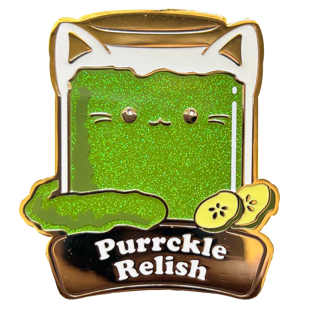 Pin of a cat shaped jar of pickle relish. Text reads 'Purrckle Relish'.