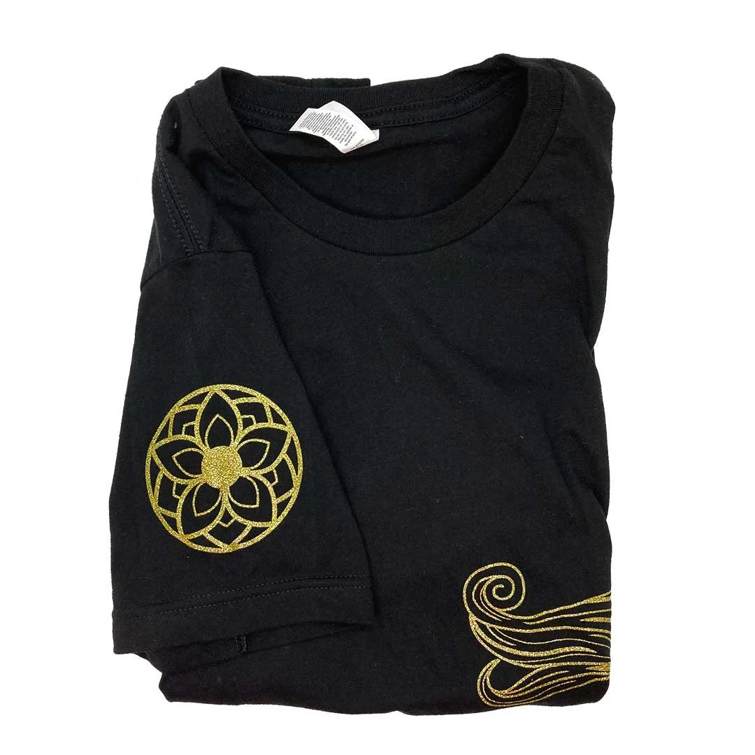 Sleeve detail on a black shirt showing a Korean flower design.
