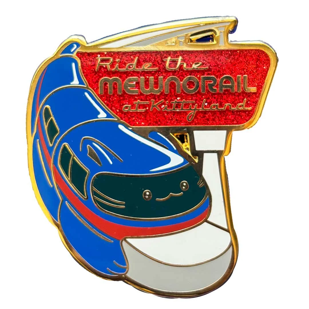 Enamel pin mockup of a monorail shaped like a cat. Text reads 'Ride the Mewnorail at Kittyland'.