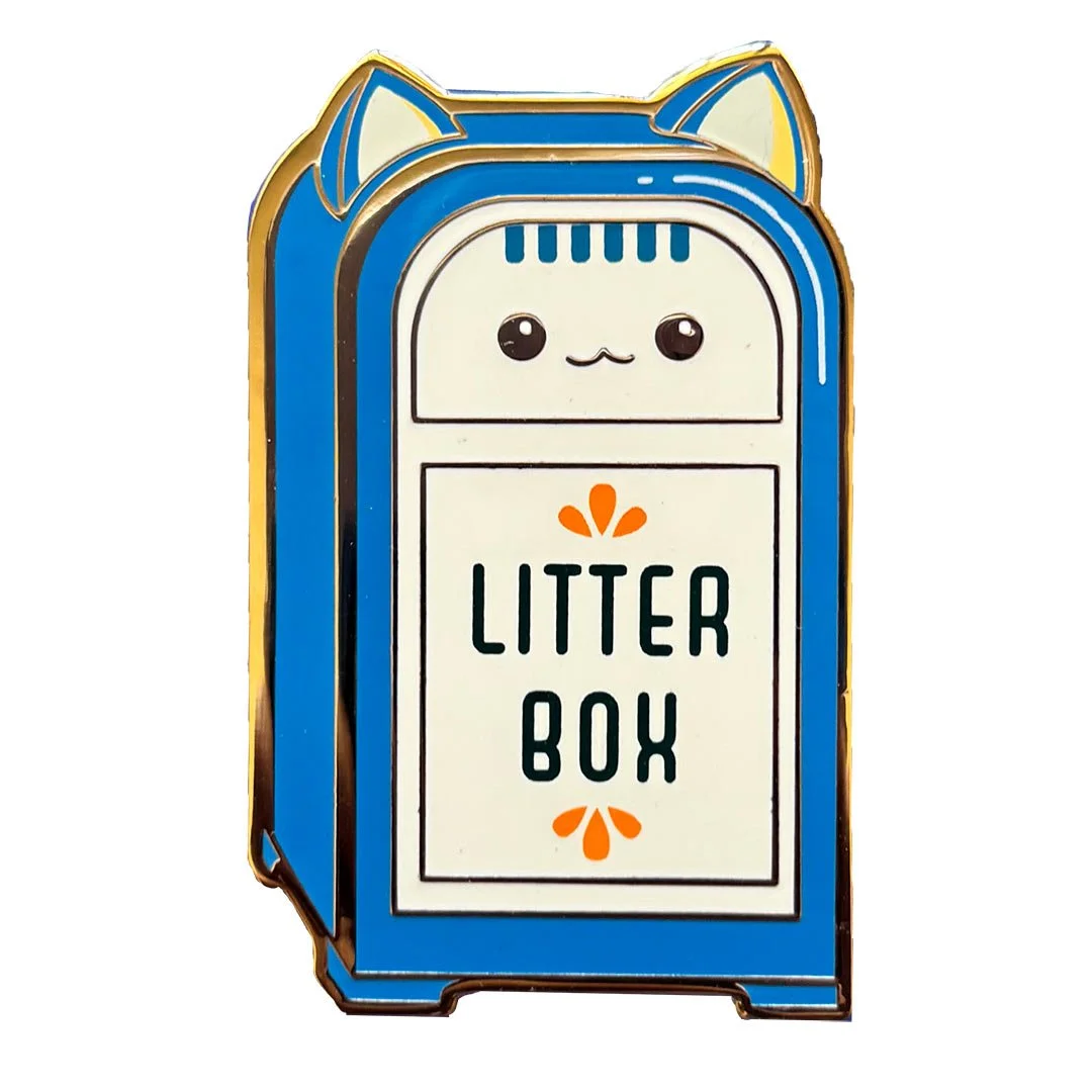 Enamel pin of a cat shaped trashcan labeled 'Litter Box'.