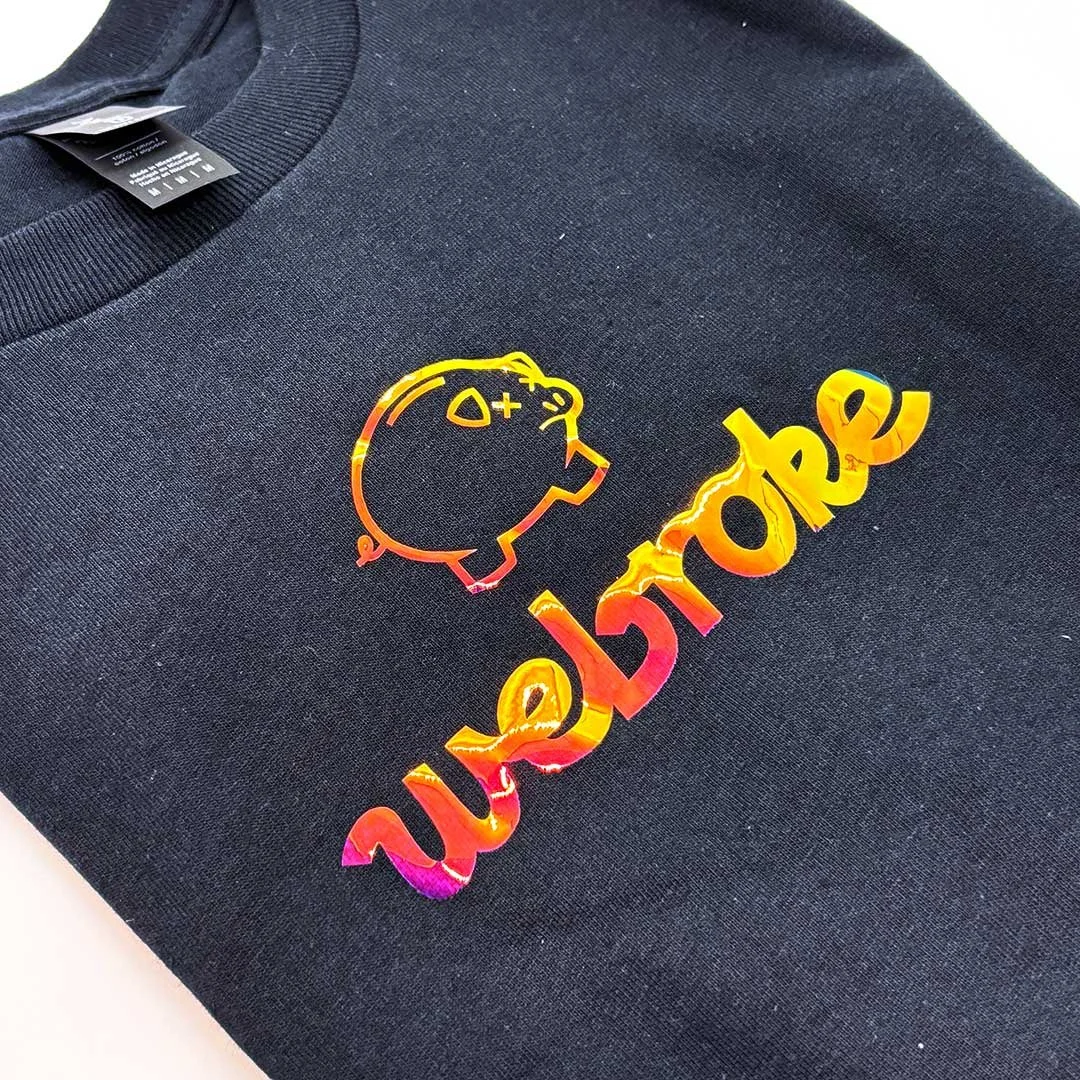 Black shirt with a sad piggy bank and the words 'webroke, but we happy'.