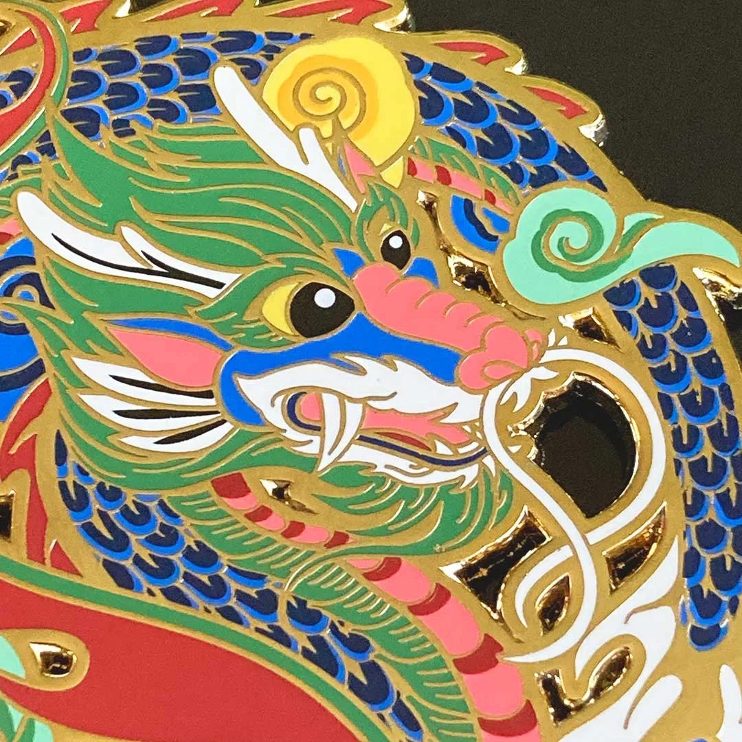 Detail of a Korean style dragon enamel pin.