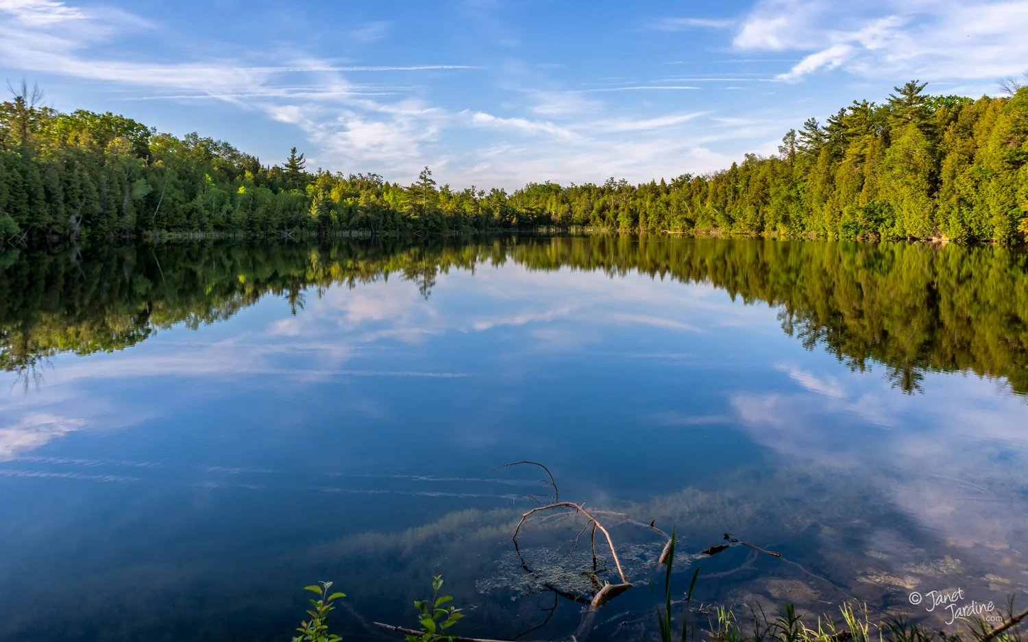 Reflecting-at-Crawford-Lake_Photo_copyright_Janet_Jardine.jpg