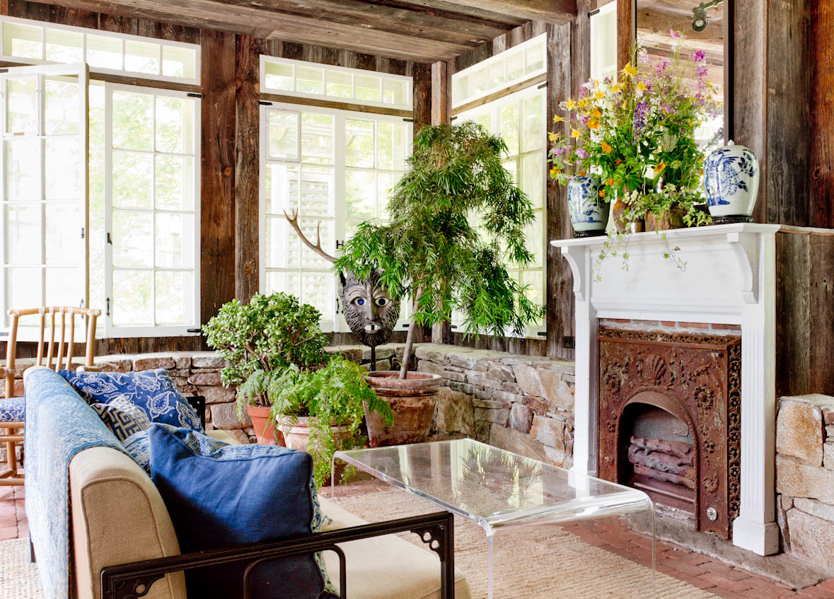 rustic-connecticut-farmhouse-porch-fireplace.jpg