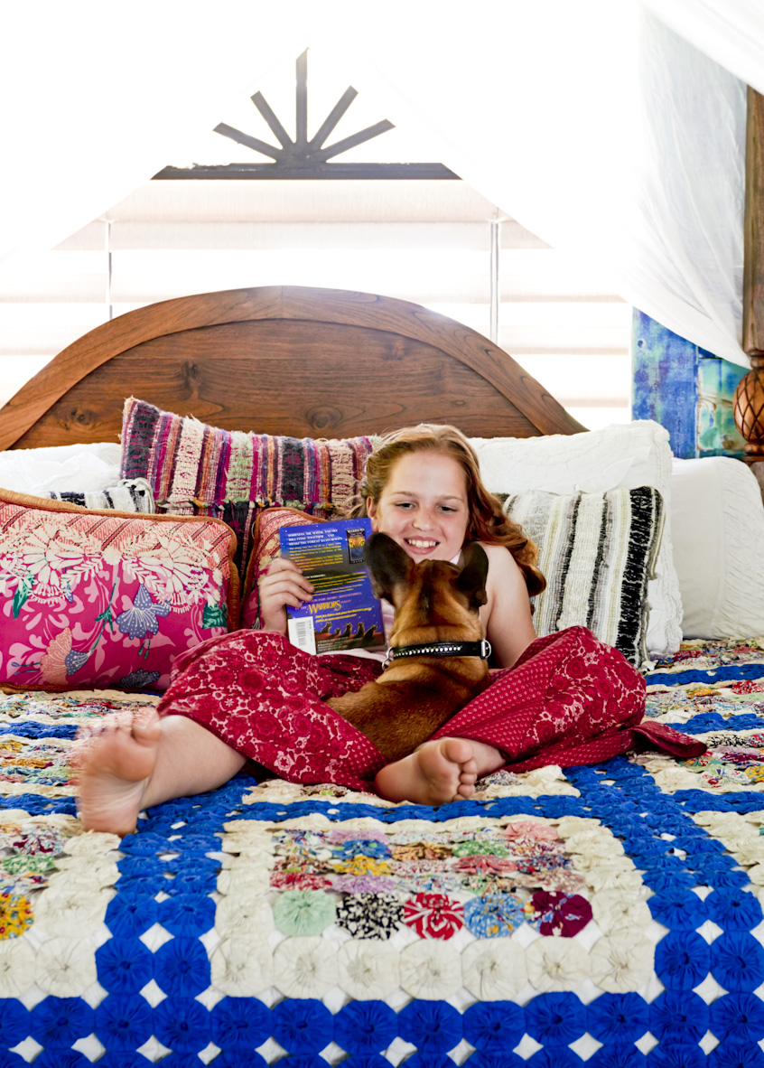 bohemian-girl-reading-bedroom-dog-lifestyle-photography.jpg