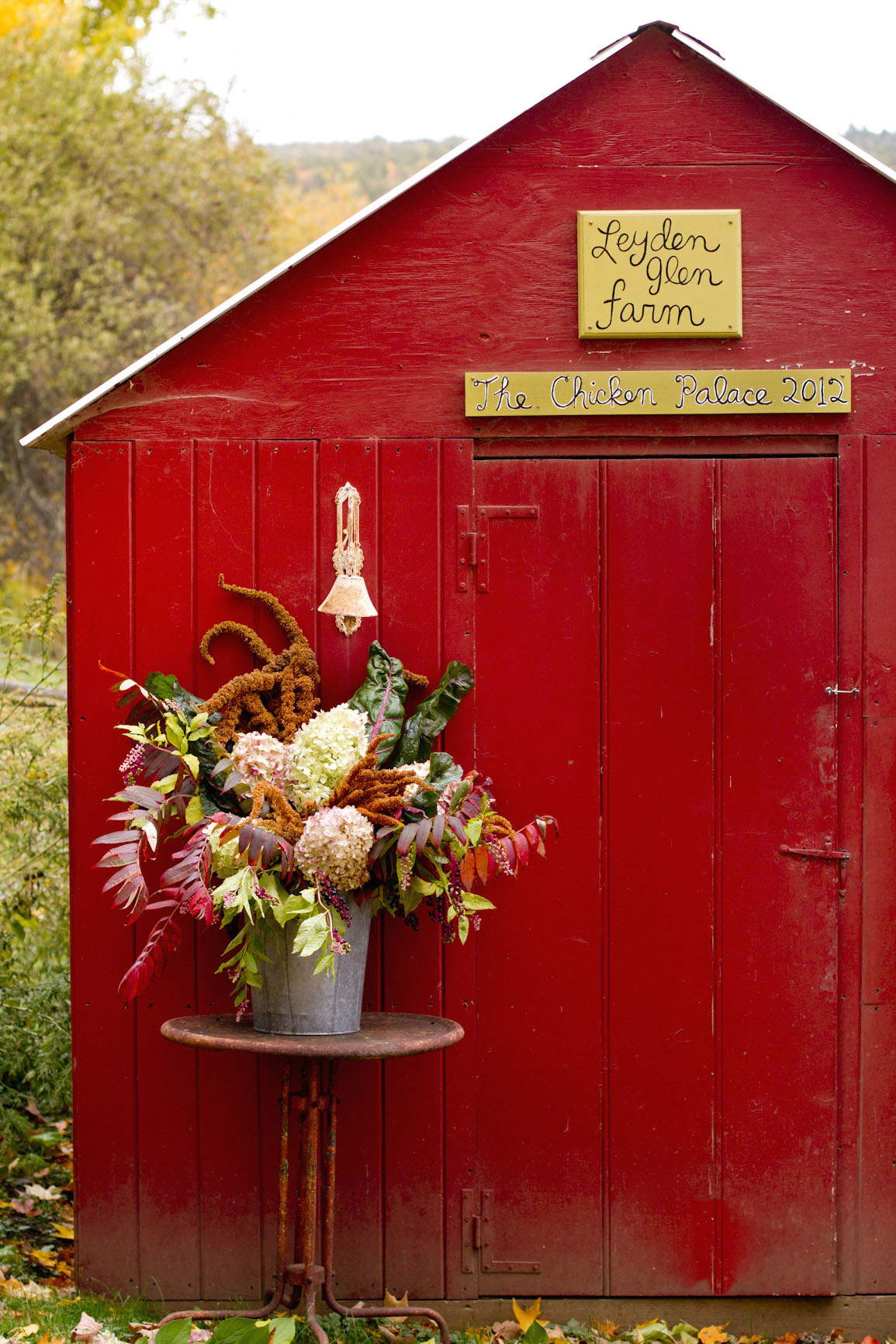 red-barn-autumn-flowers.jpg