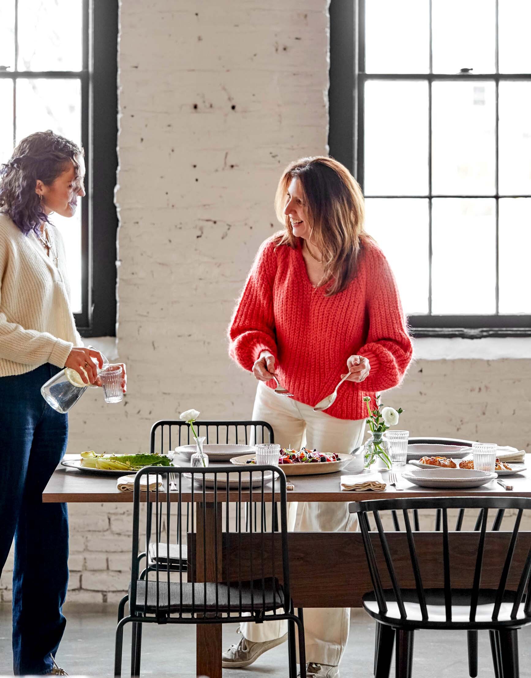 women-setting-table-for-dinner-party-1 copy.jpg