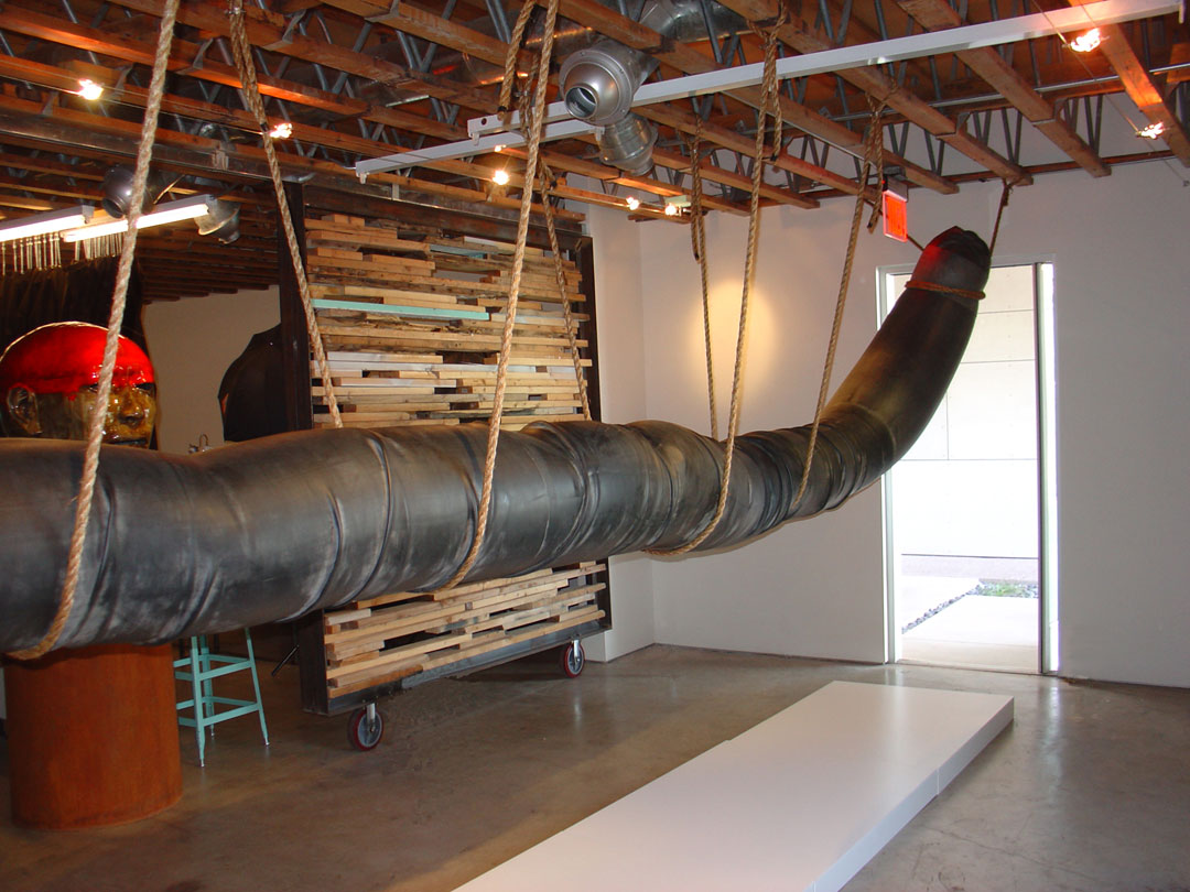 "WOMB #3", 2010, rubber and rope, 18' L