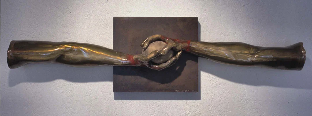 "Two Arms and a Stone #2", 2002, bronze, acrylic and stone, 52" L