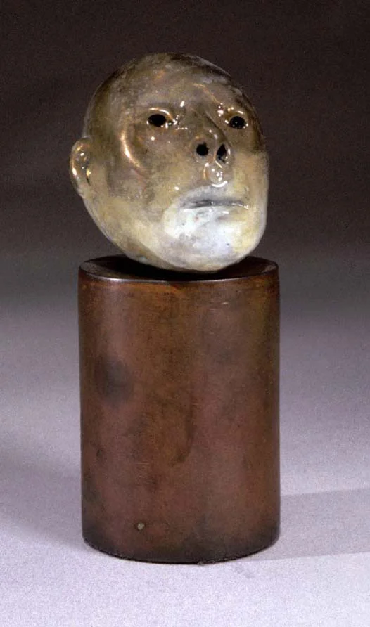 "Small Head Series #7", 2002, bronze, acrylic and steel, 4.5" H, ed. 12