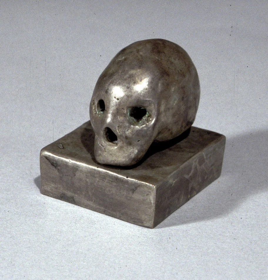 "Deadhead", 2000, bronze and silver nitrate patina, 2" H