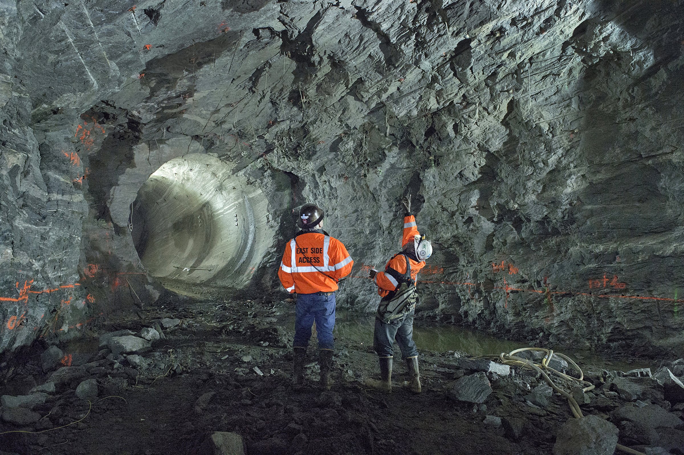 Engineers Inspects Raw Rock