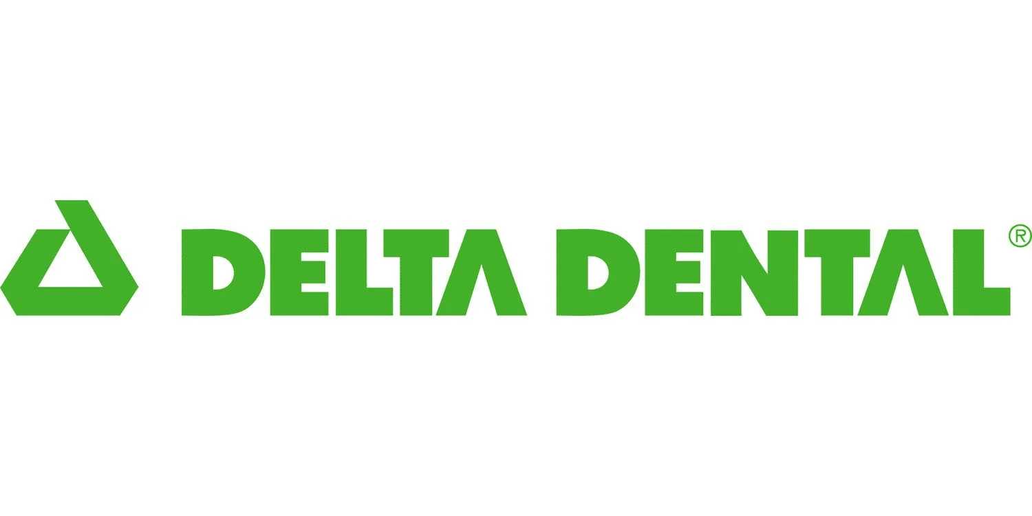 Green logo of Delta Dental, a stylized triangle icon followed by the company name in bold green letters.