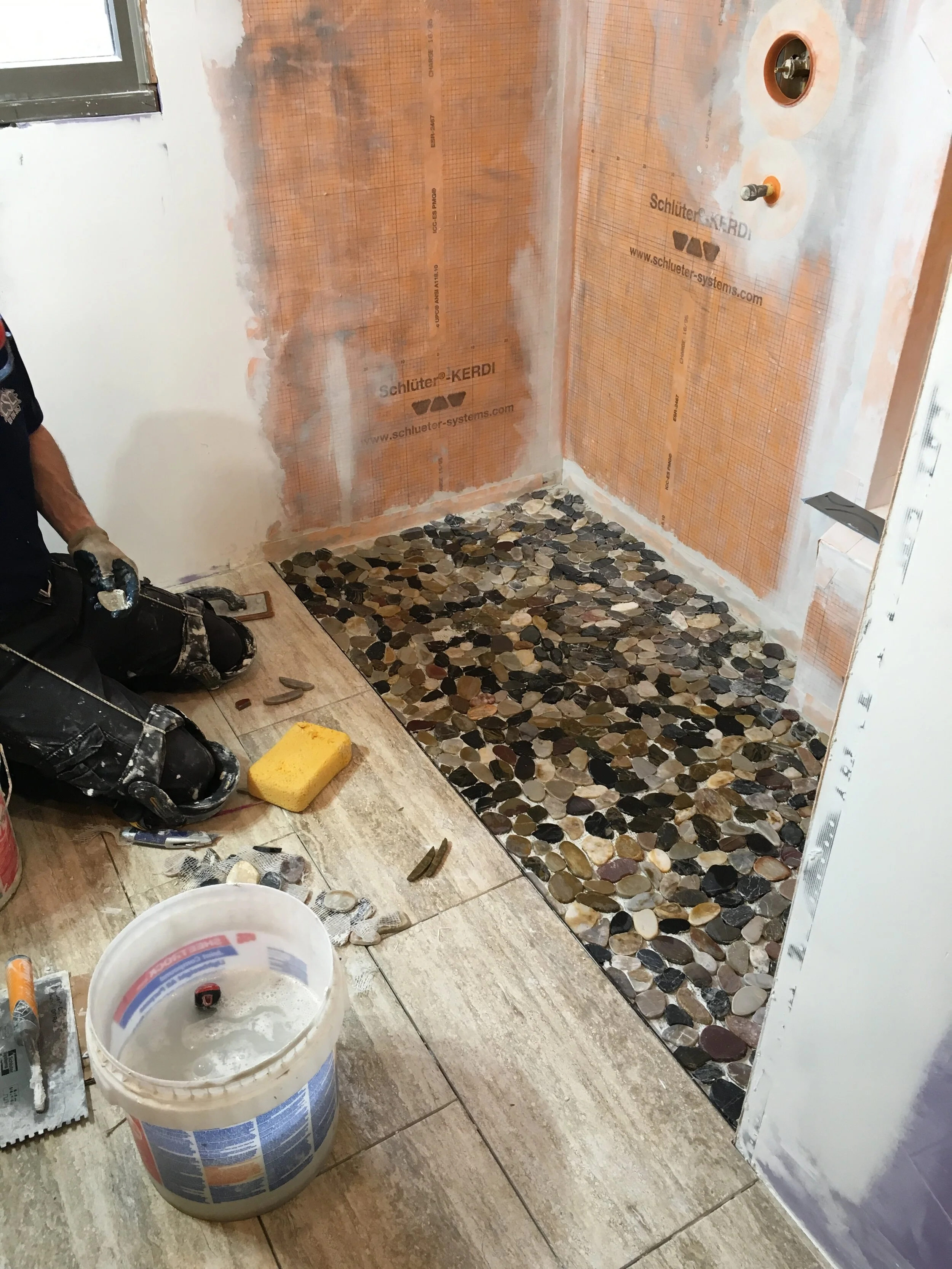  We used Schlüter Systems components to design the shower to owner’s specification.  