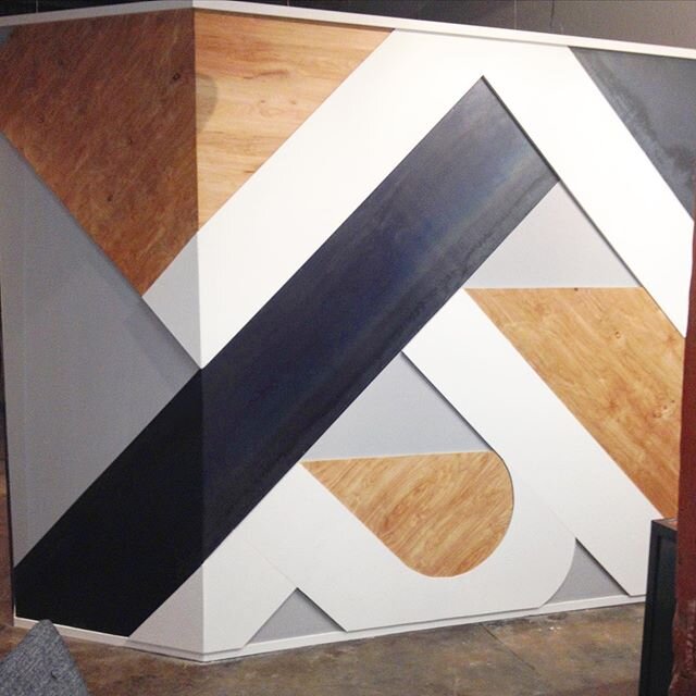 Custom wall installation wrapping the corner. Steel, plywood, Mdf and paint. Hand done cuts w a grinder, circular saw and jig saw. #custominstallation #custommetalwork #metalart #walldisplay #woodandmetal #interiordesign #installation #wallart #walld