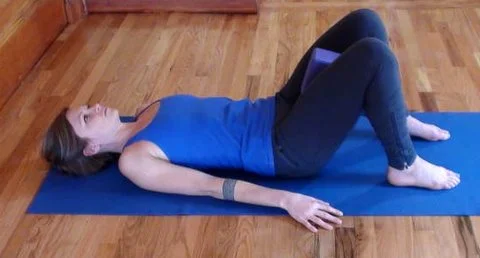 Block in between the inner thighs laying supine is a great way to activate the transverse and rectus abdominus.