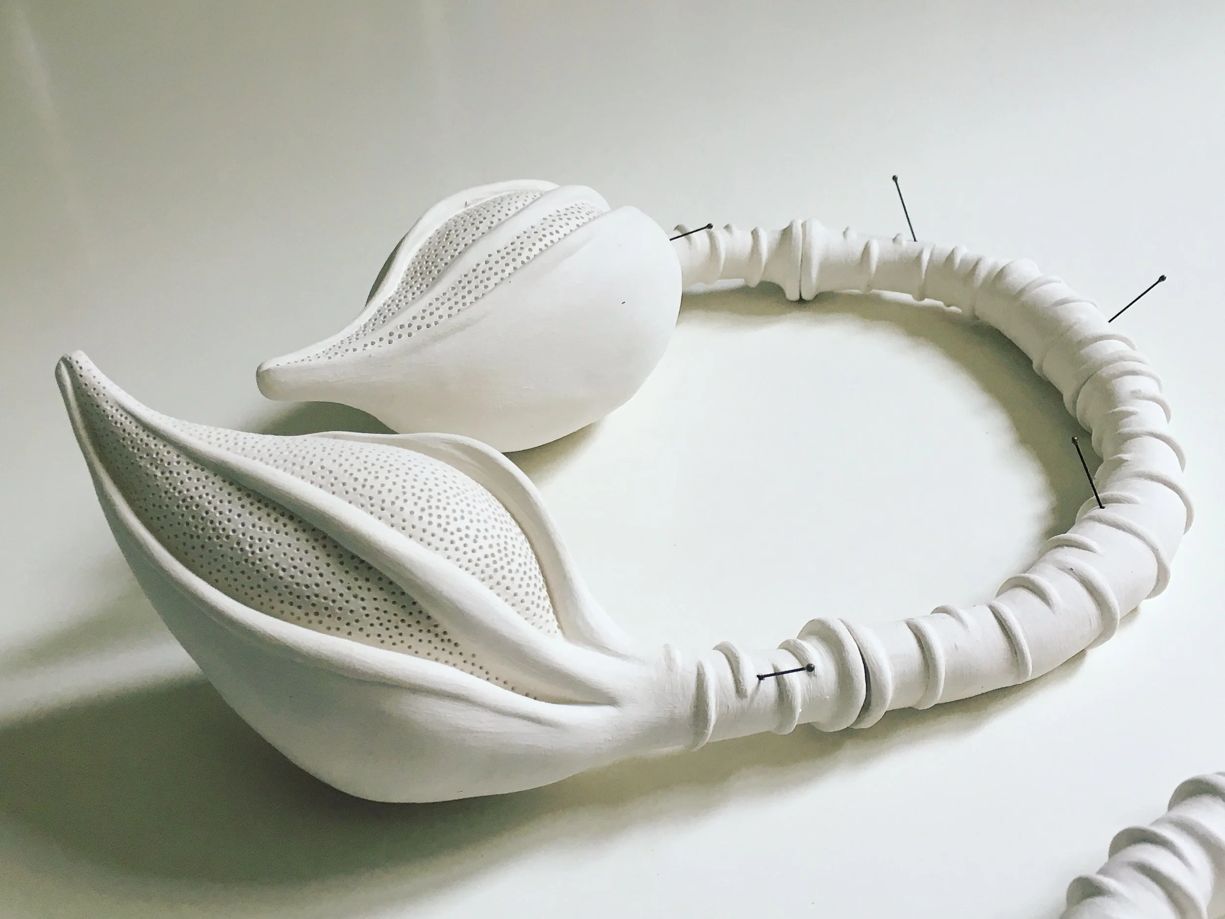 Sarah Rayner. Gynoecium . Work in progress. 2017. Hand carved porcelain with entomology pins.