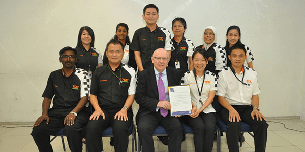 TOC Management Team sharing a photo session with Mr Maurice