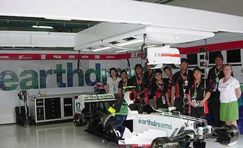 Once-in-alifetimeexperience:TOC winnerscelebratingtheir win in theHonda F1 pit.Image from: The Star Online