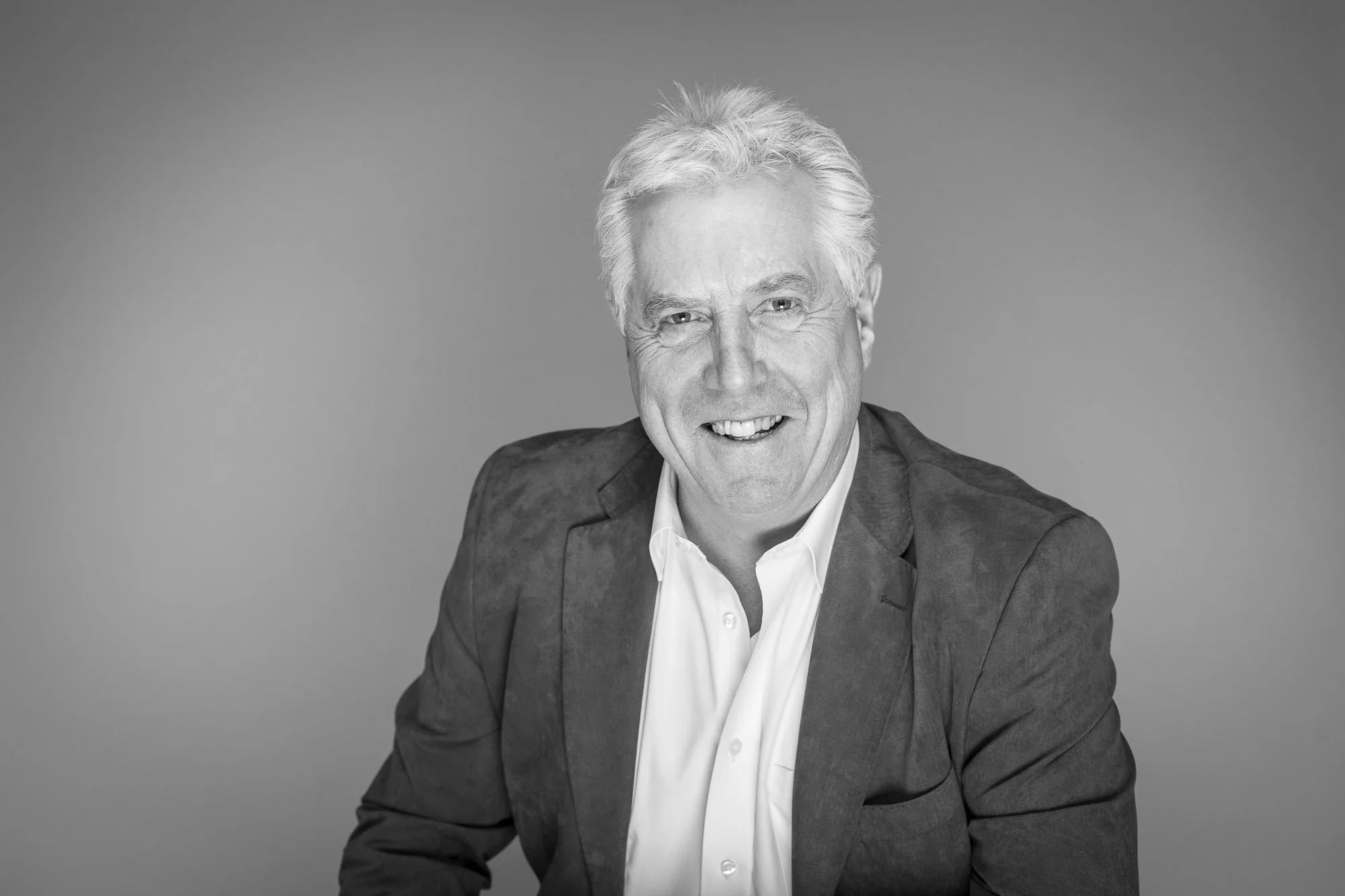 Corporate headshot professional businessman grey suit Hertfordshire