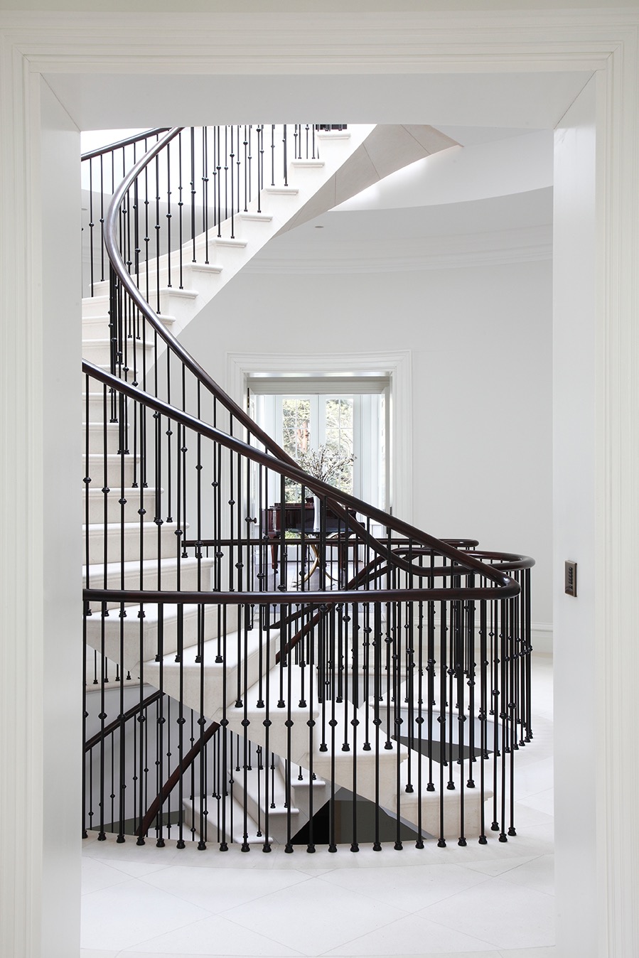 CEM ACROSS STAIRS PORTRAIT.jpg