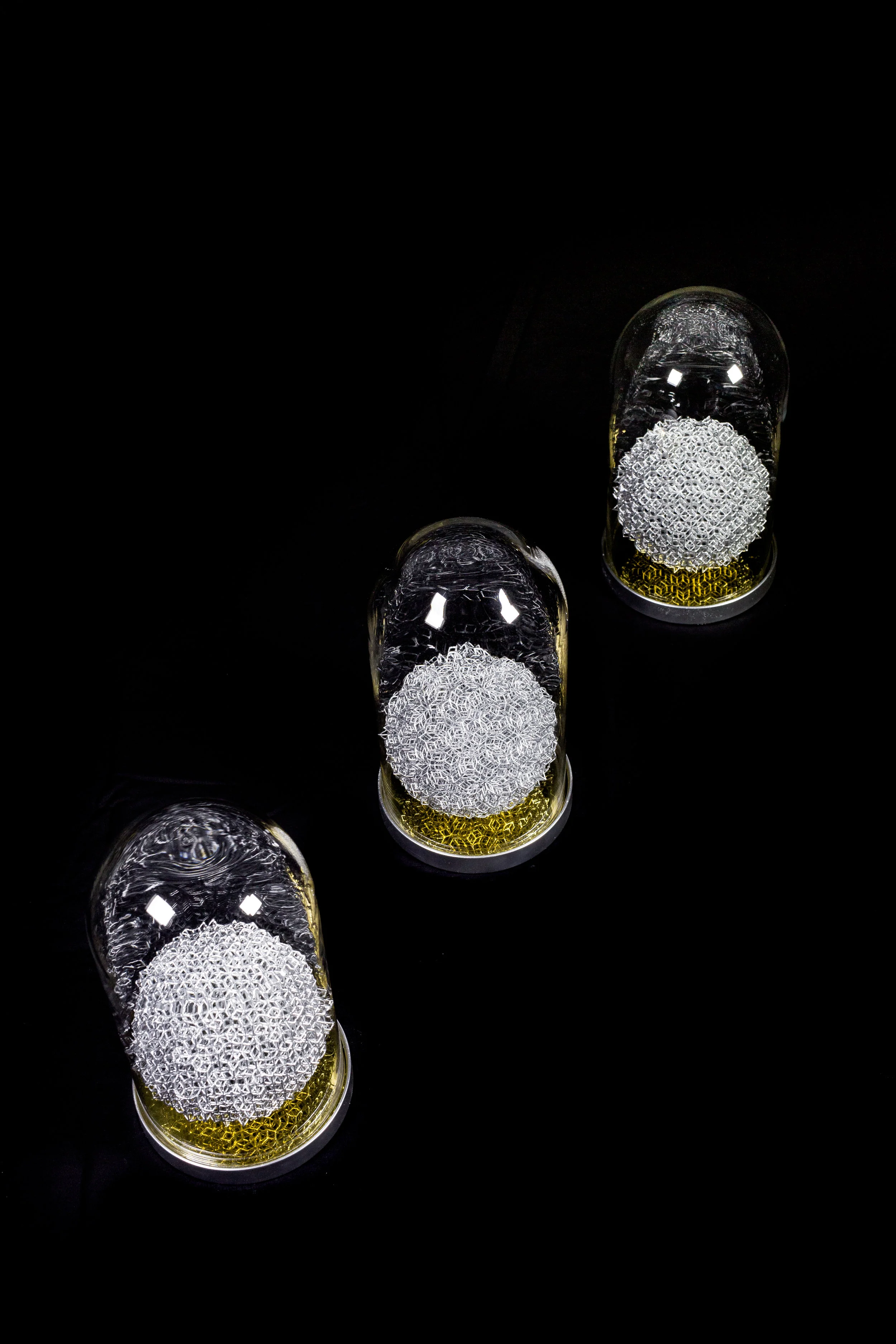 photo of quasicrystal cluster spheres with glass bell caustics