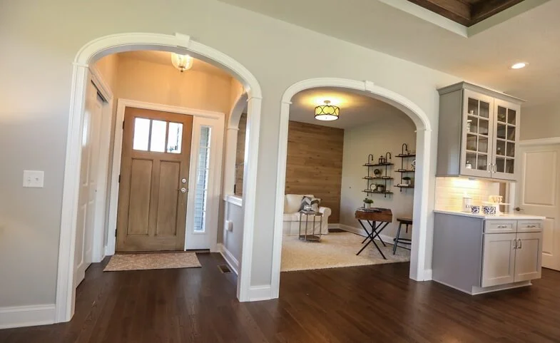 Front door opens to kitchen