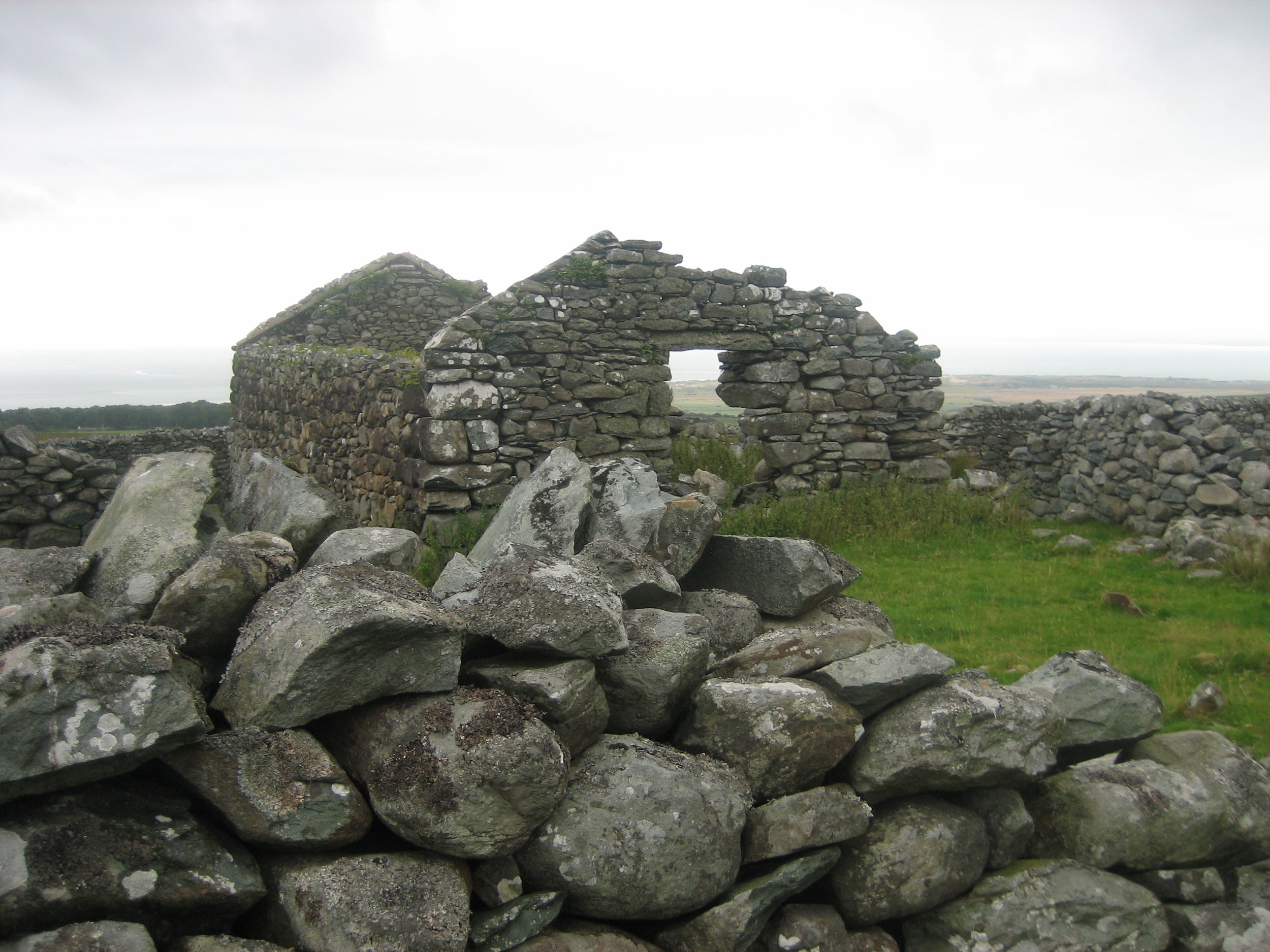 Ruined building, mountains overlooking Cardigan Bay