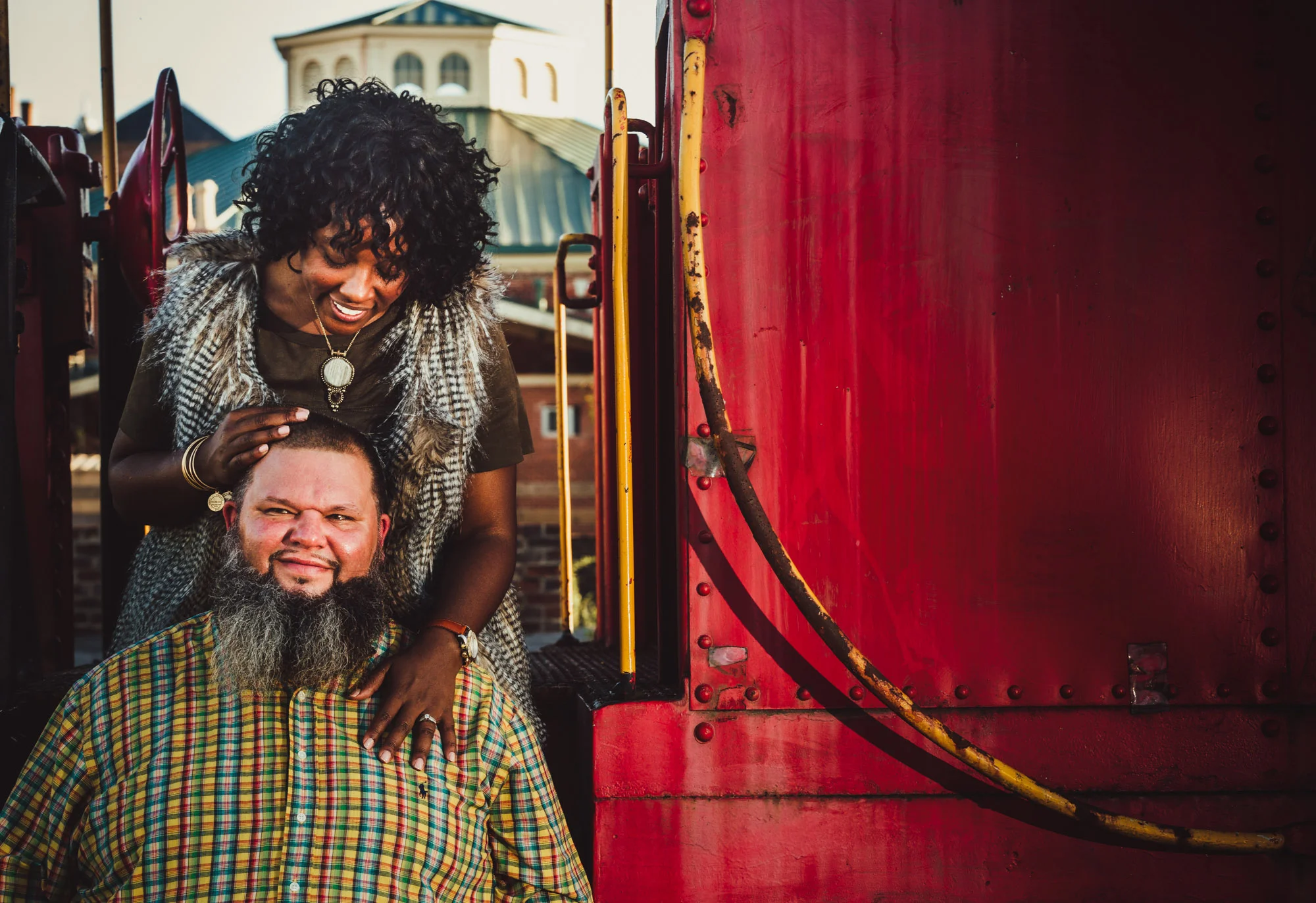 couple hugging on a train car.jpg