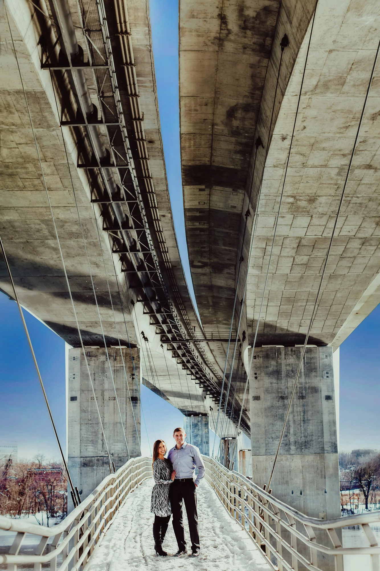 couple on walkway under bridge.jpg
