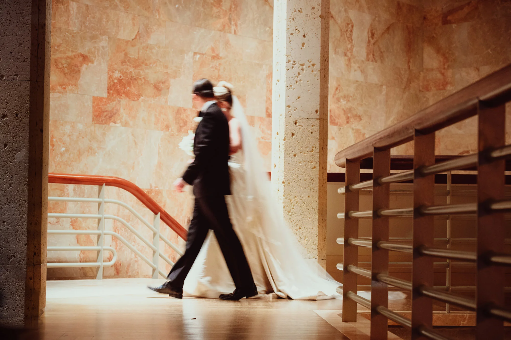bride and groom walking to reception.jpg