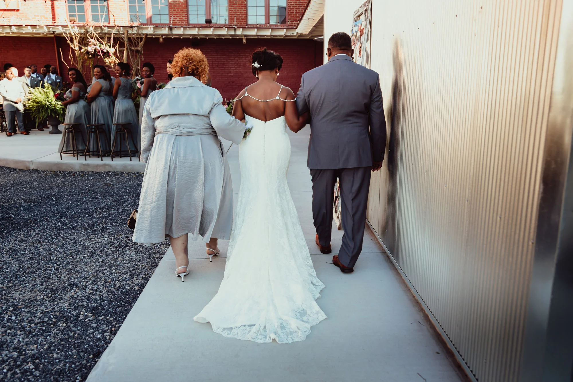 bride and parents entering ceremony.jpg