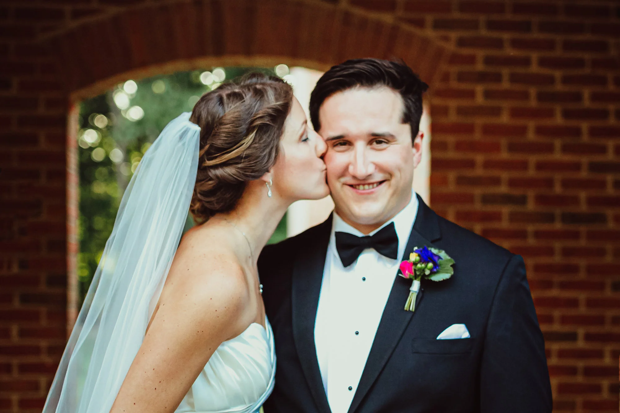 bride kissing groom.jpg