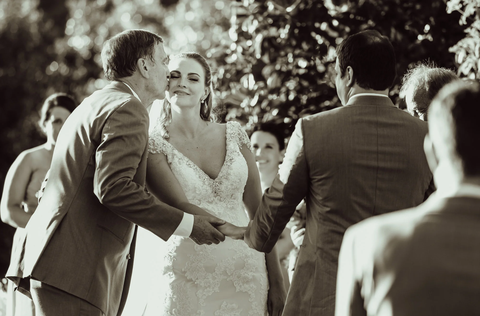 father kissing bride.jpg
